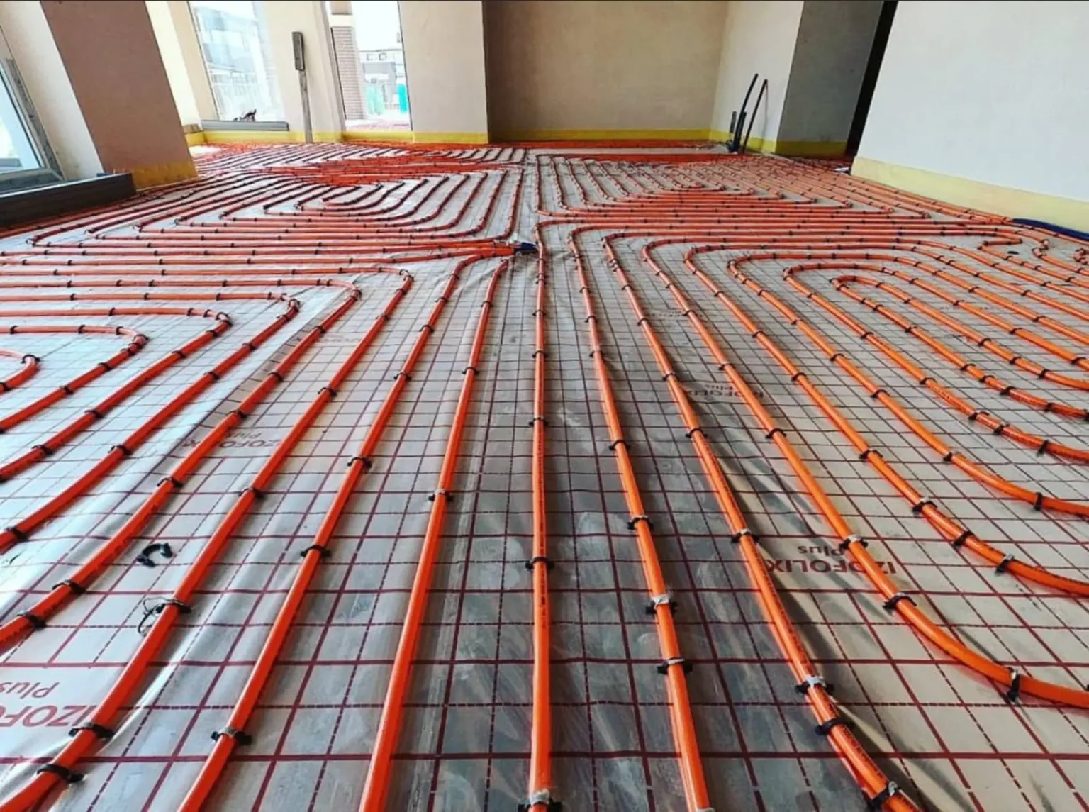 Sump pump and mechanical room piping in a Barrie basement