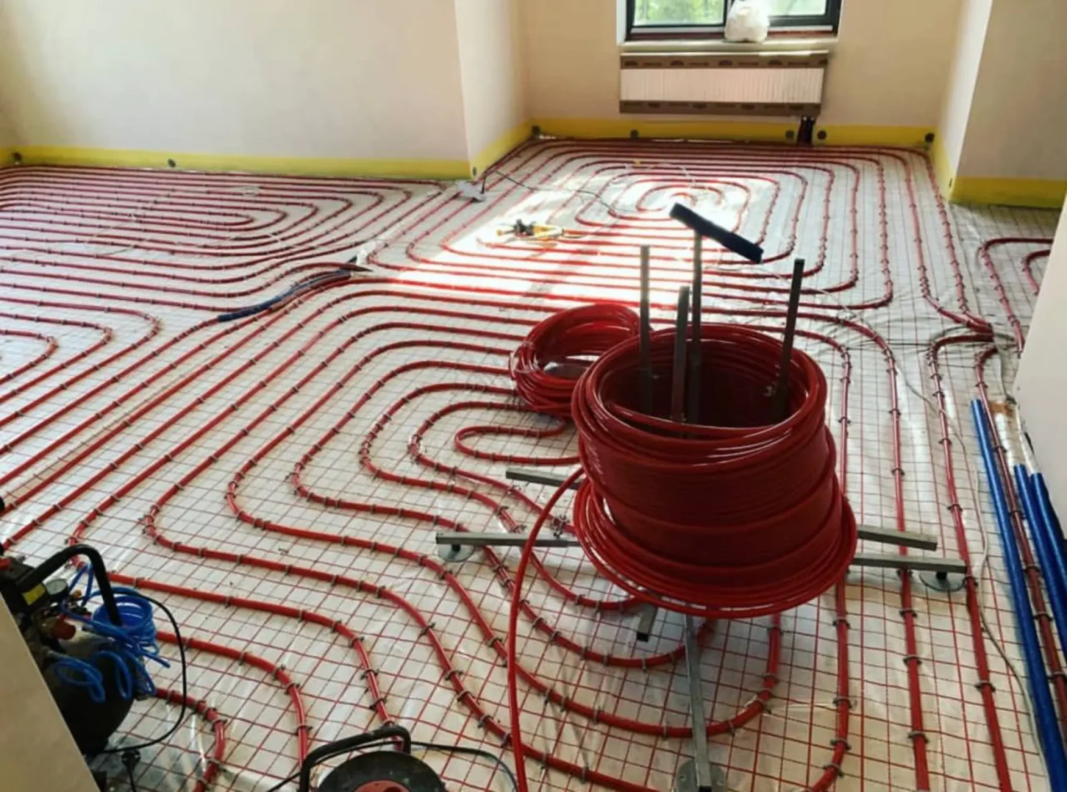 Radiant heating and plumbing manifold installation